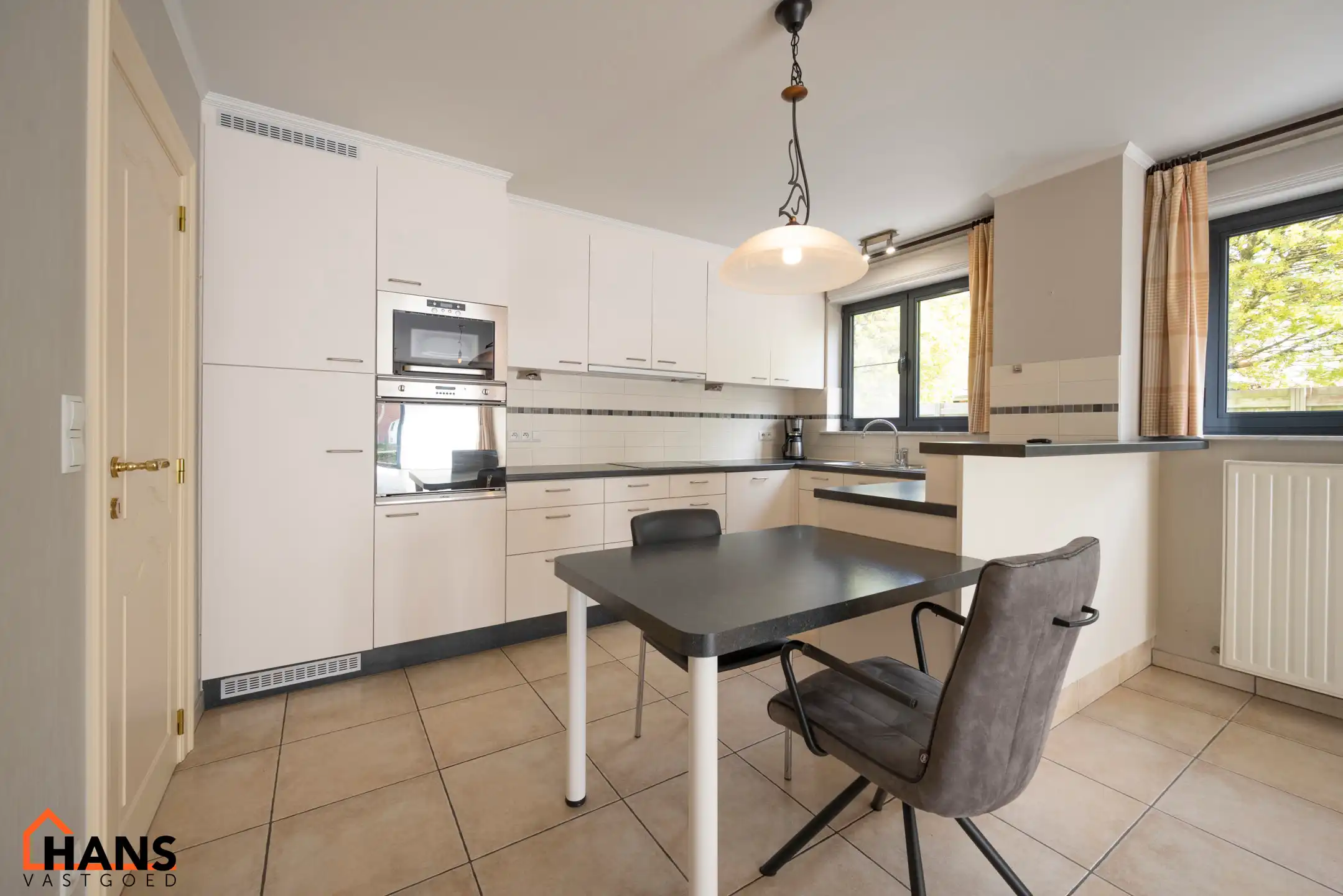 Uniek gelijkvloers appartement. foto 5