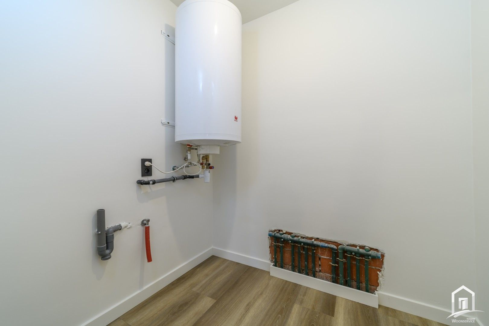 Totaal gerenoveerd gelijkvloers-appartement met tuintje foto 17