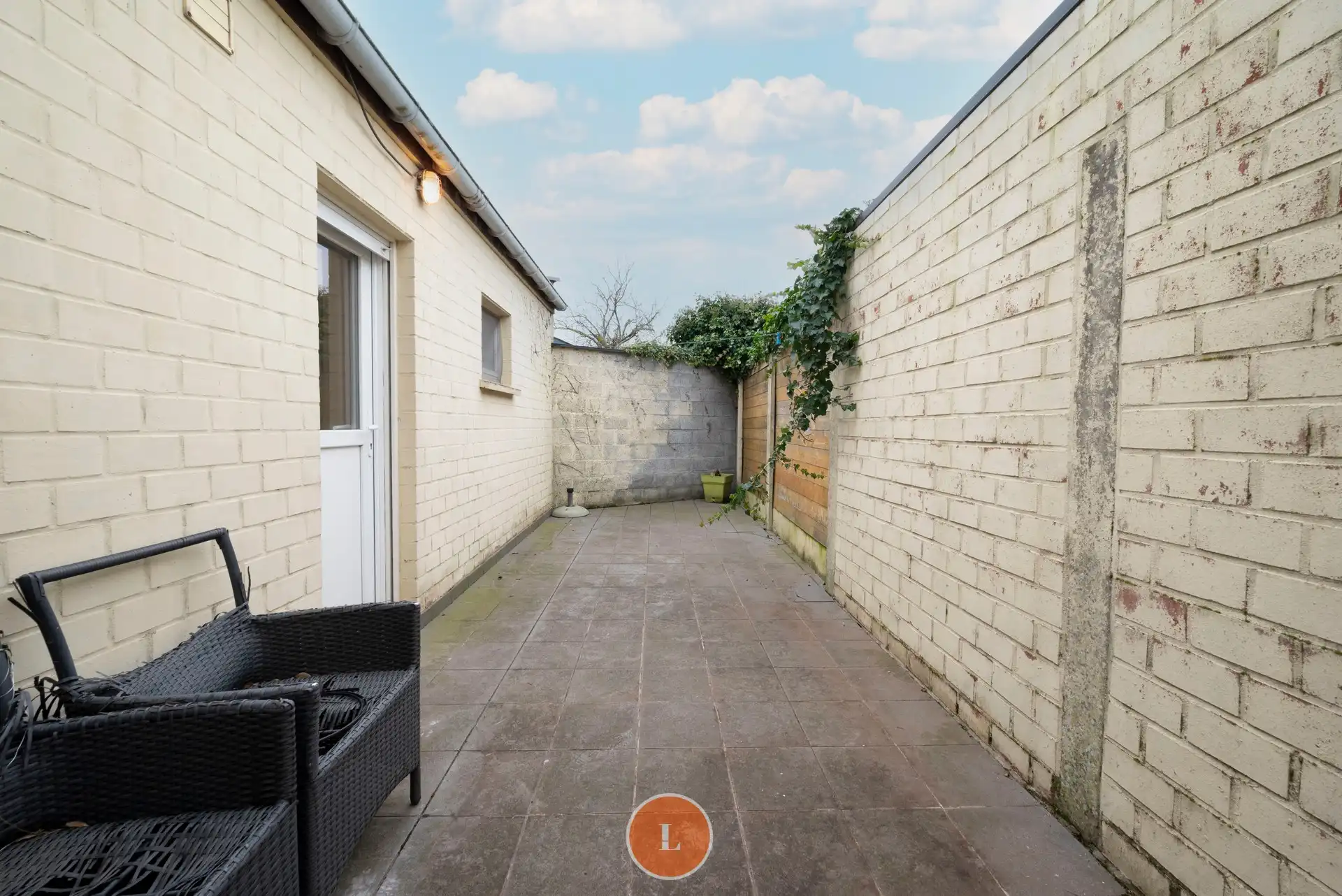 Instapklare woning met 2 slaapkamers, gezellige tuin en garage. foto 12