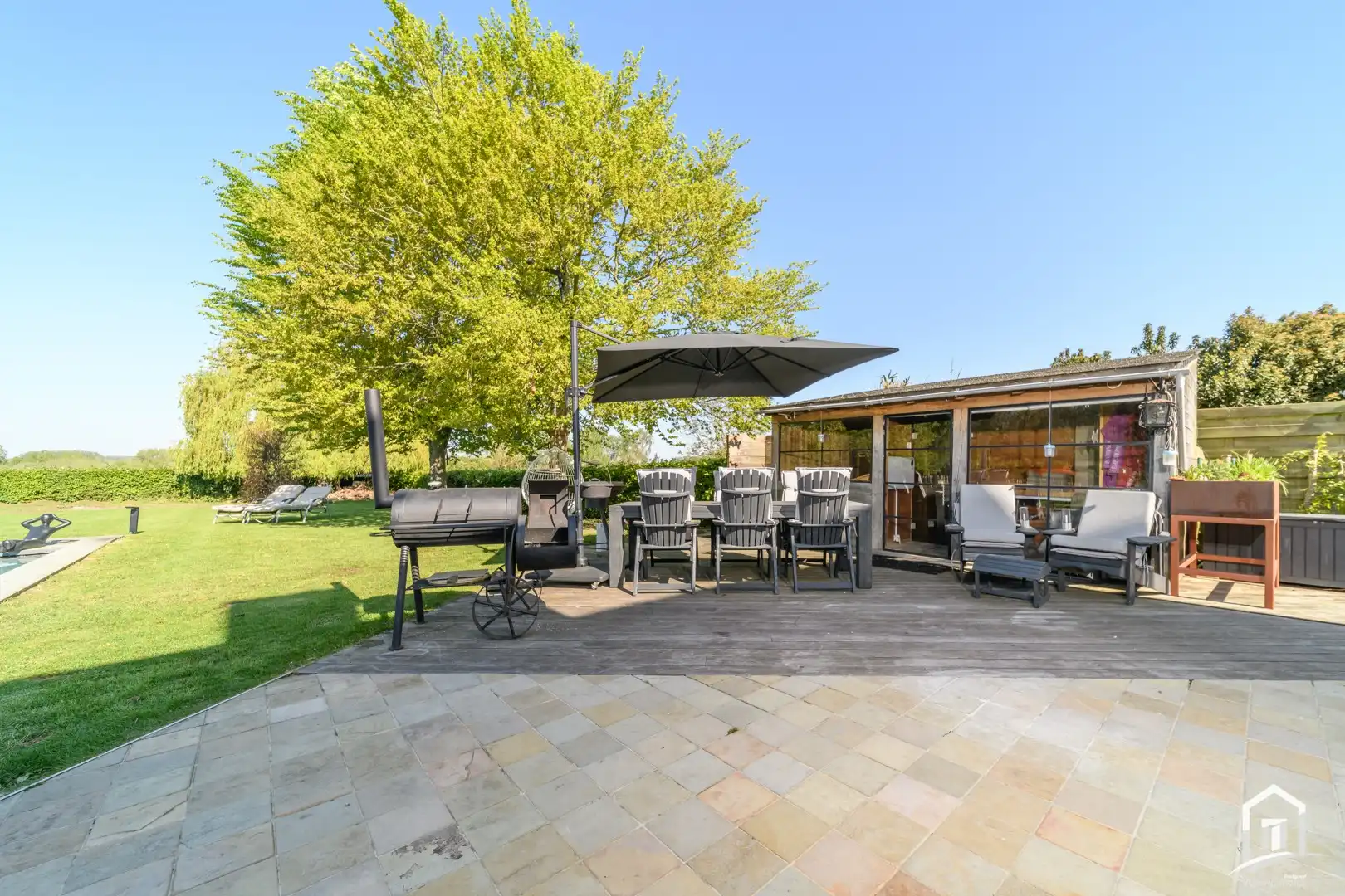 Instapklare villa met 3 SLK's, garage en riante tuin met zwembad foto 22