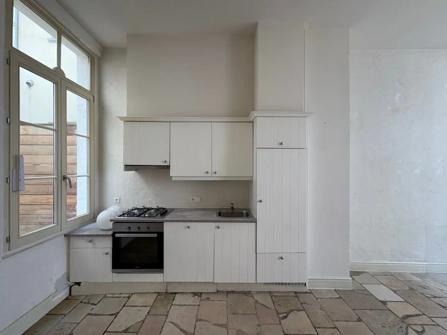 Charmante stadswoning met 2 slaapkamers en gezellige koer in Mechelen foto 4