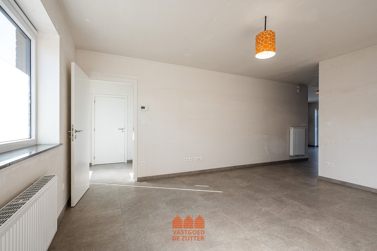 Ruime en energiezuinige woning in een rustige woonwijk te Sint-Laureins foto 3