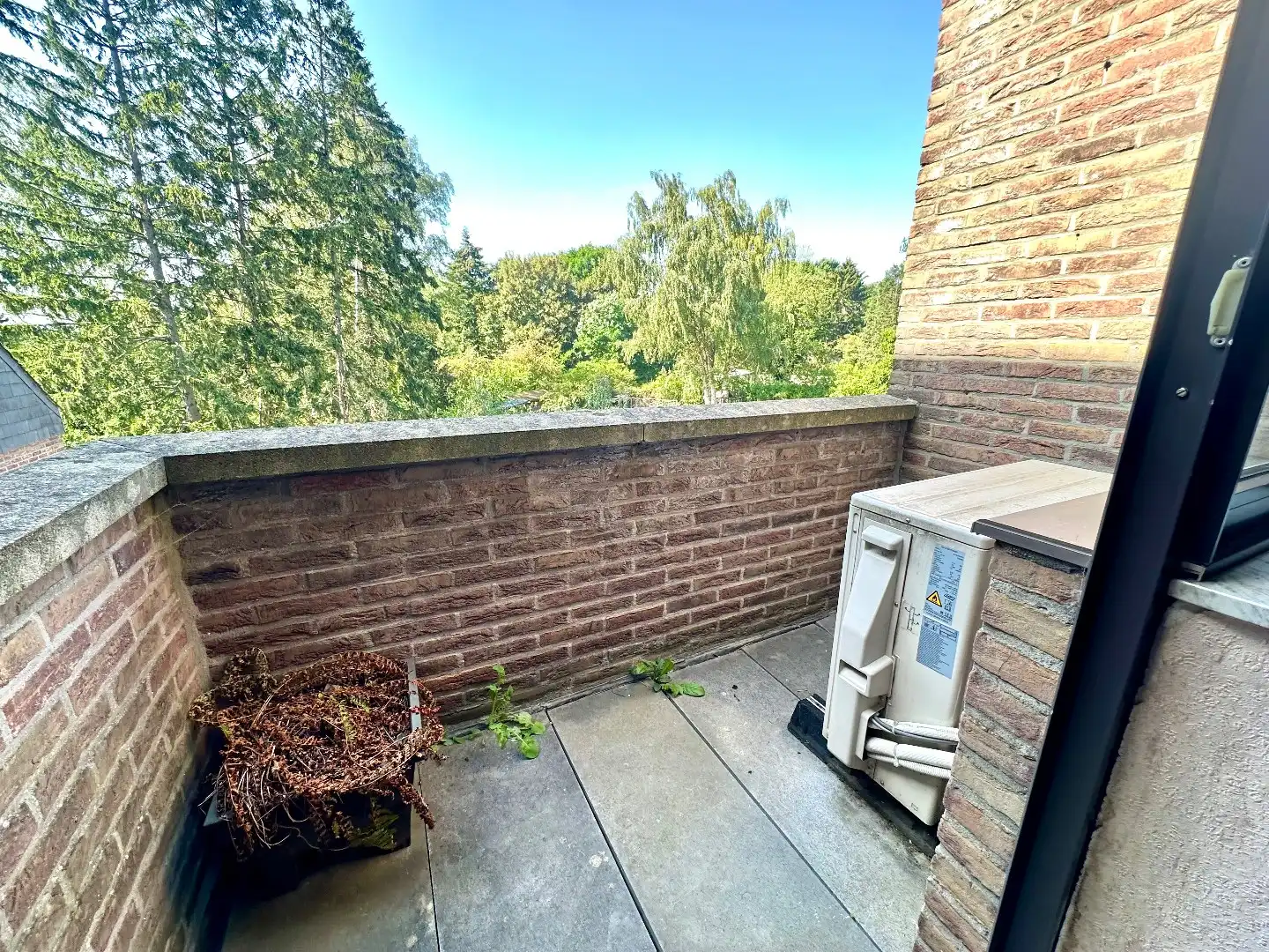 Ruim en centraal gelegen appartement in Tongeren met 2 slaapkamers, terras, garage en berging foto 15