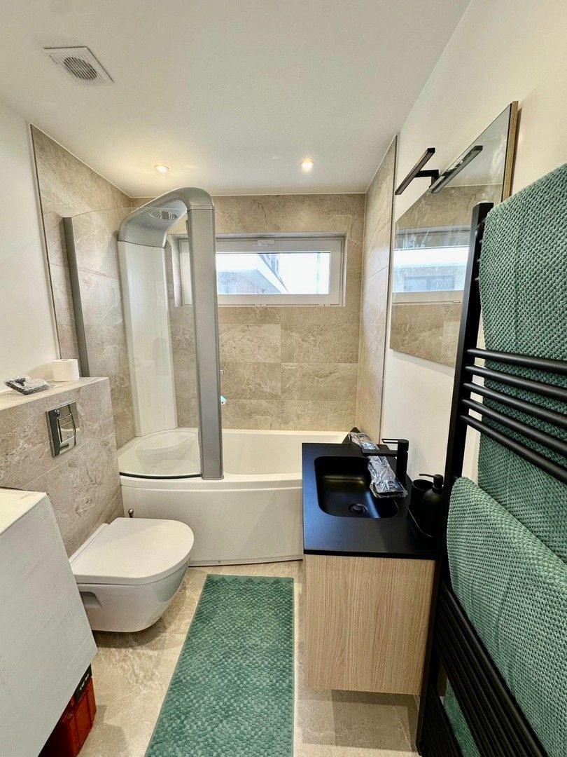 Appartement met twee slaapkamers, volledig gerenoveerd, op wandelafstand van het strand van Duinbergen. foto 13