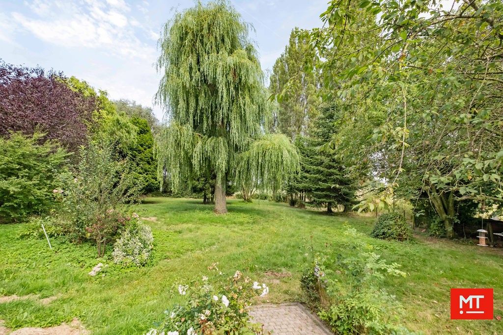 CHARMANTE WONING MET EEN PRACHTIGE TUIN OP EEN LANDELIJKE LOCATIE TE BESELARE foto 5