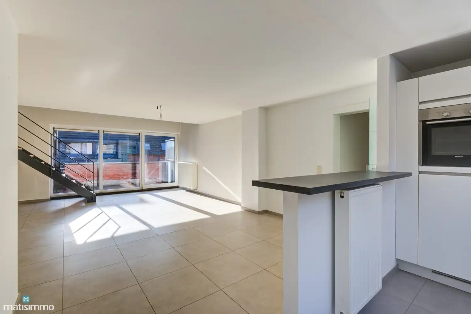 DUPLEXAPPARTEMENT MET 3 SLAAPKAMERS, TERRAS EN ONDERGRONDSE AUTOSTAANPLAATS NABIJ HET CENTRUM VAN BILZEN foto 7