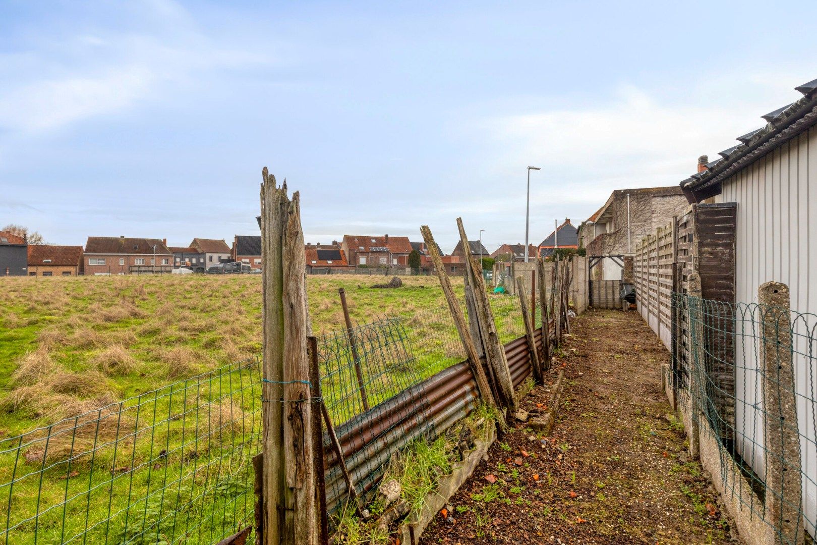 Ruime woning met 4 slaapkamers, garage en tuin in een leuke buurt! foto 18