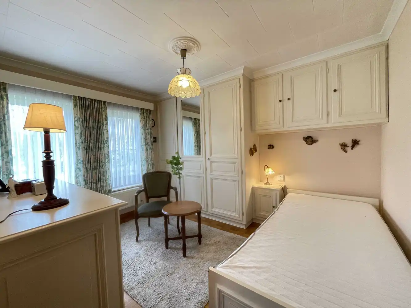 Charmante woning met grote tuin foto 17