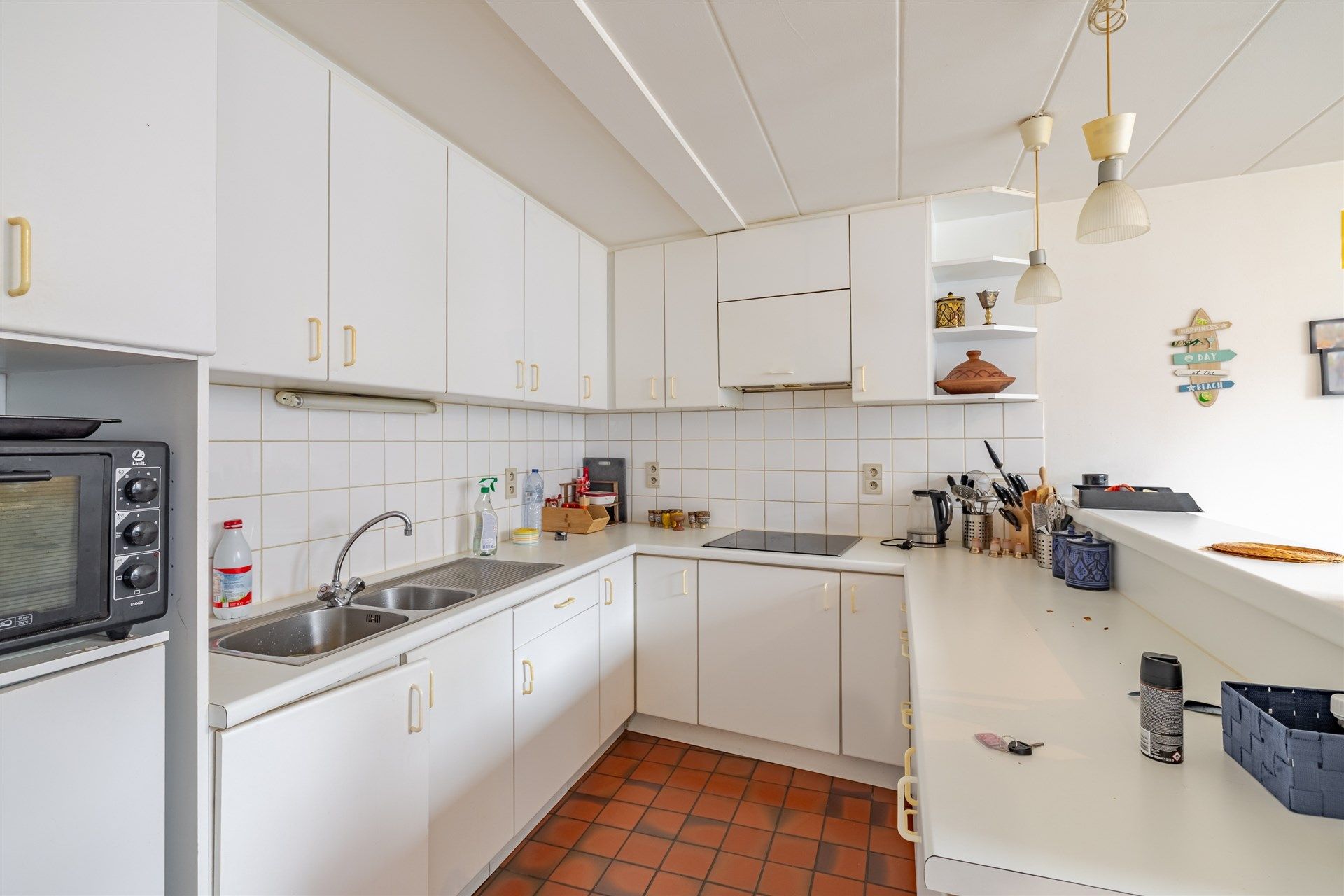 Opbrengsteigendom bestaande uit 4 appartementen + 22 garageboxen + magazijn/werkplaats foto 10