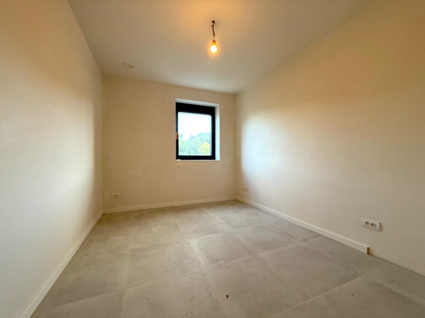 Nieuwbouw half open bebouwing met carport foto 8