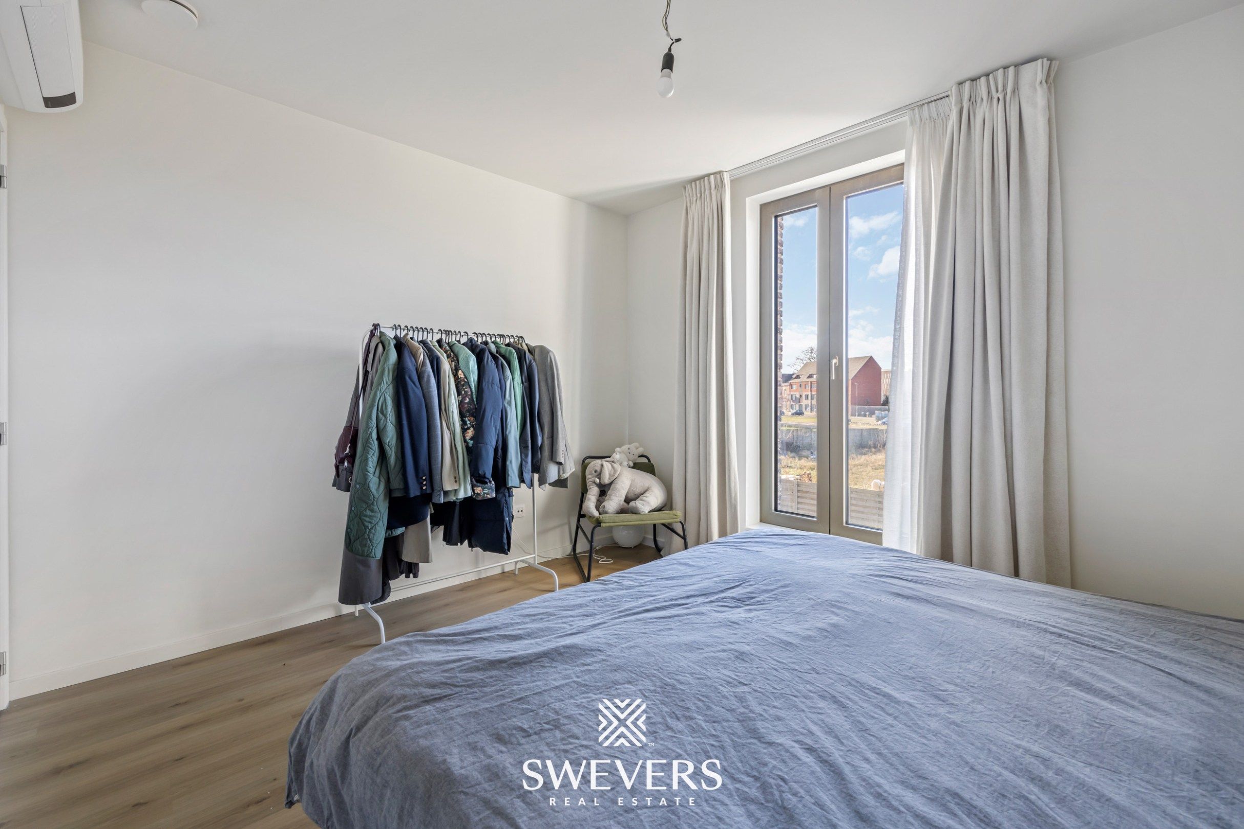 Recent 2 slpk- appartement met autostaanplaats en berging in centrum Beringen foto 17