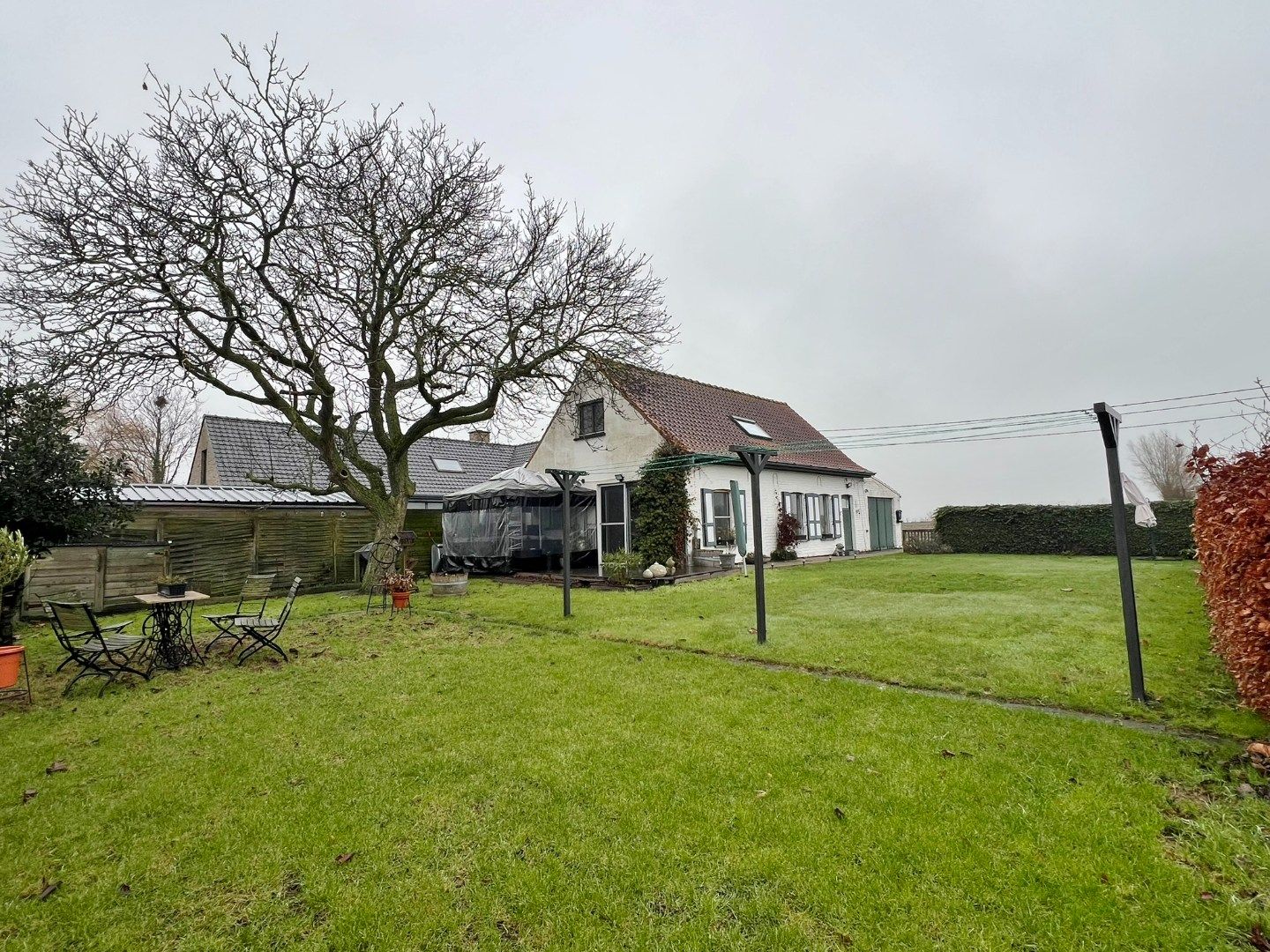 Charmante woning met zonnige tuin, prachtig zicht over de velden en garage  foto 15