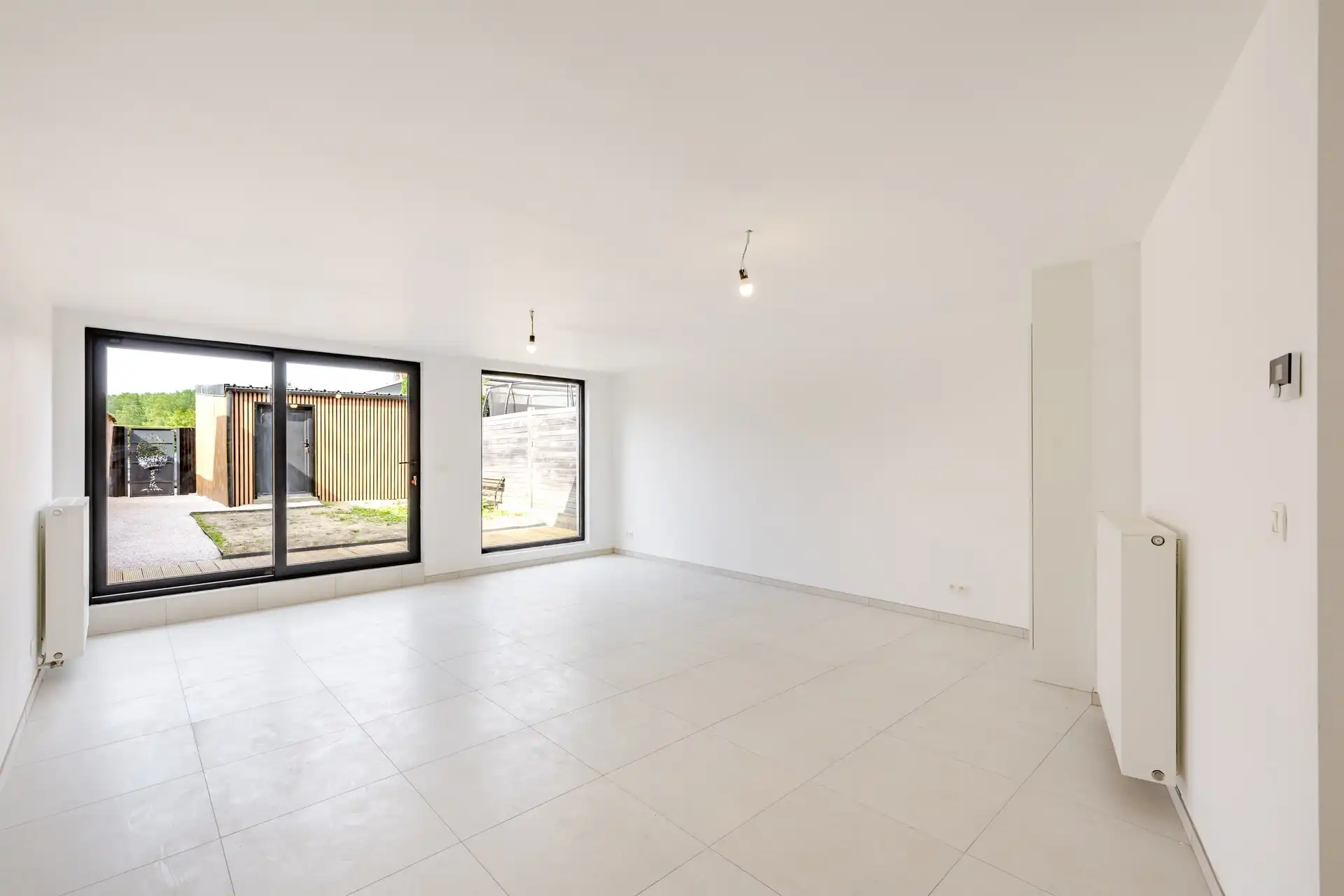 Instapklare, volledig gerenoveerde gezinswoning met 4 slaapkamers, garage en zonnige stadstuin foto 9
