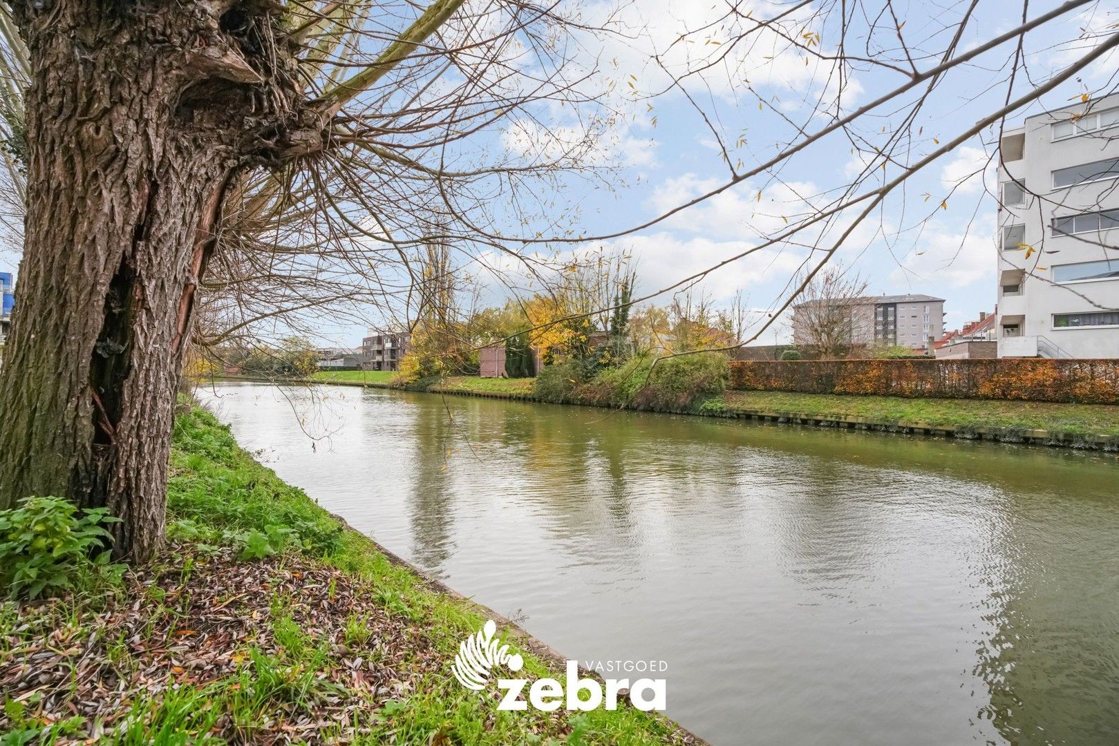 Moderne serviceflat met prachtig zicht op de Leie en autostaanplaats te Deinze! foto 25