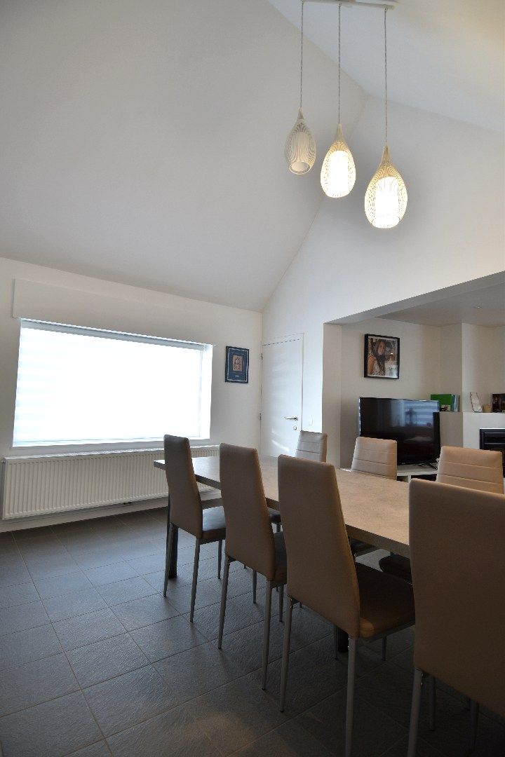 Halfopen bebouwing met 2 slaapkamers, garage en gezellig zonneterras te koop in Bellegem foto 5