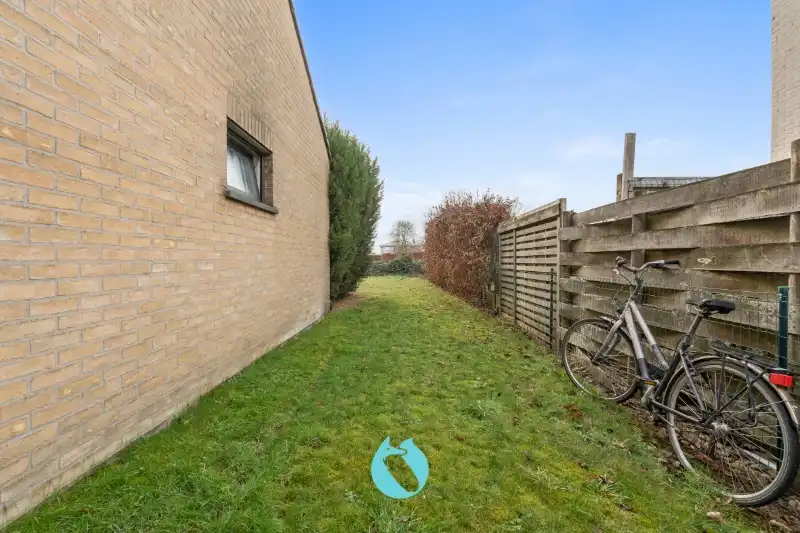 Gelijkvloers appartement met 2 slpks, tuin en garage foto 16