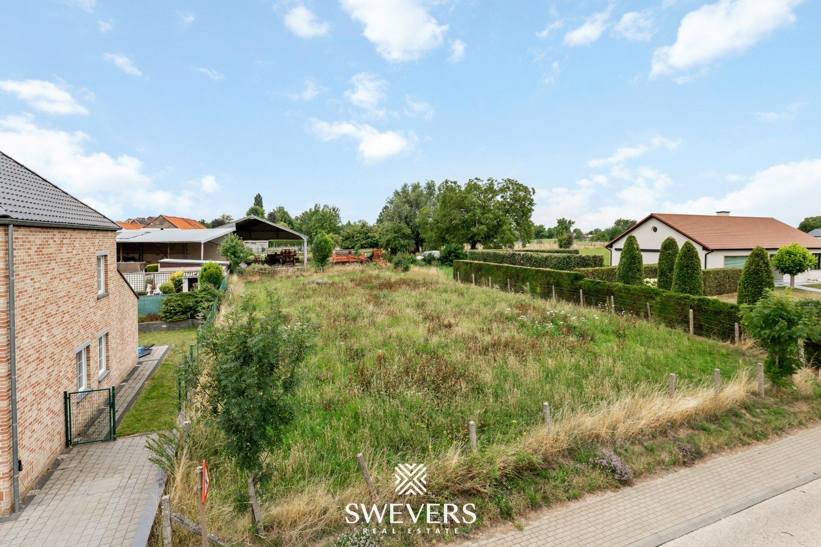 Charmant gelegen bouwgrond voor halfopen woning in Riemst foto 3