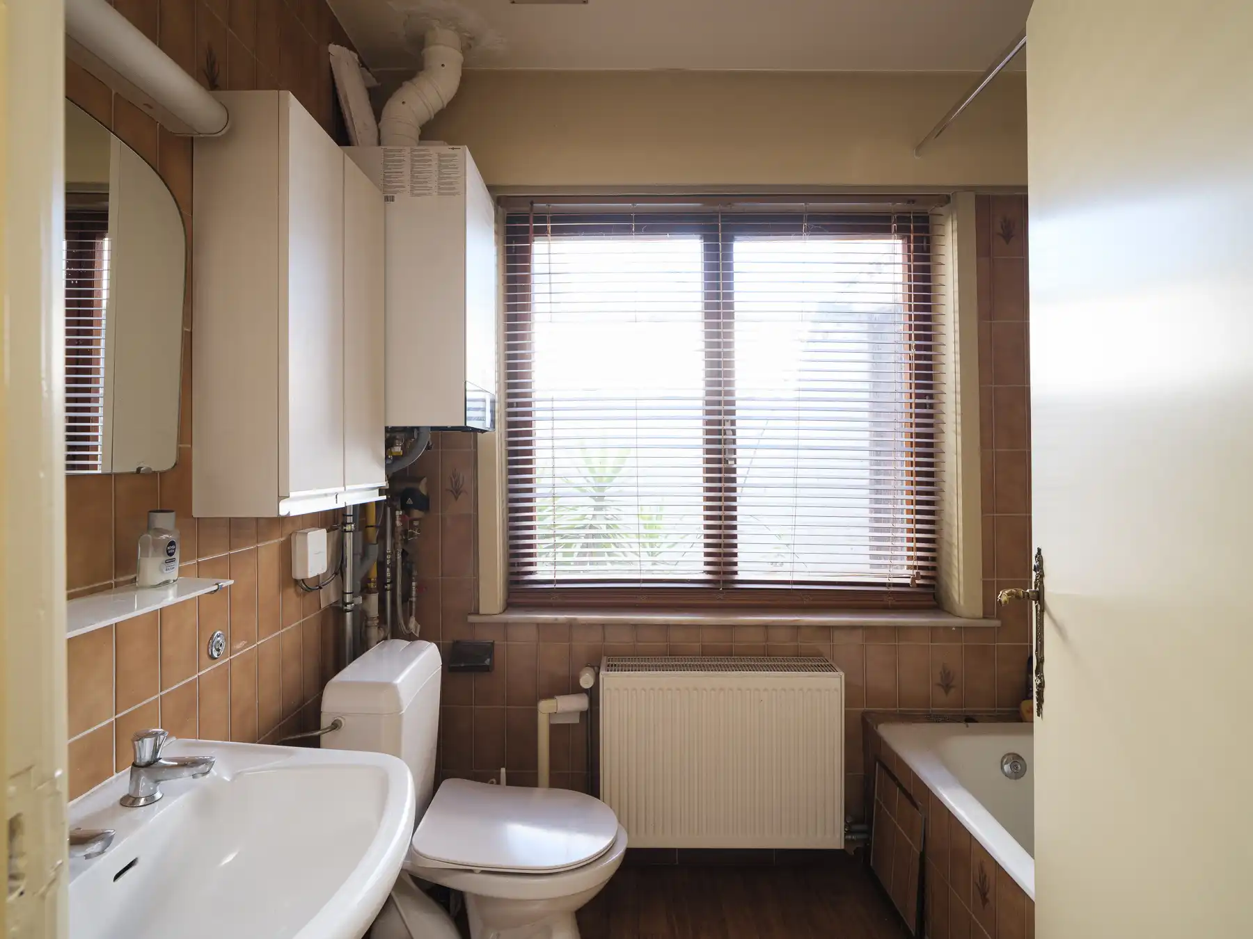 Ruim drie slaapkamer duplex-appartement met potentieel foto 13