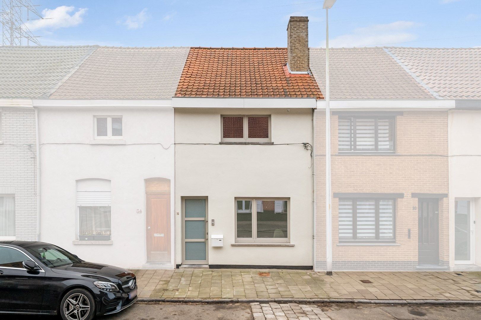 Knusse, lichtrijke woning op toplocatie nabij Gent foto {{pictureIndex}}