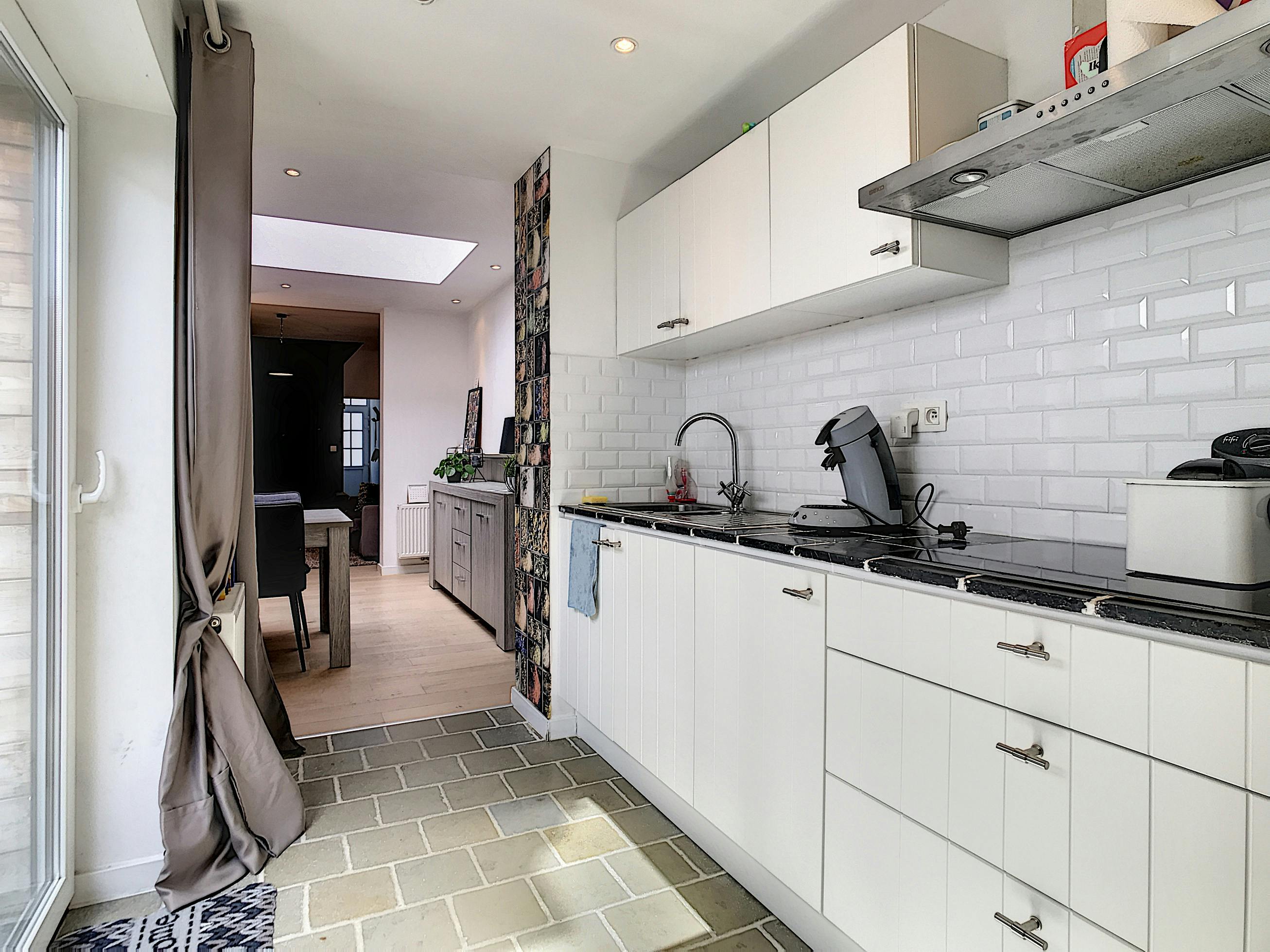 Instapklare rijwoning te koop met gezellige stadstuin  foto 5