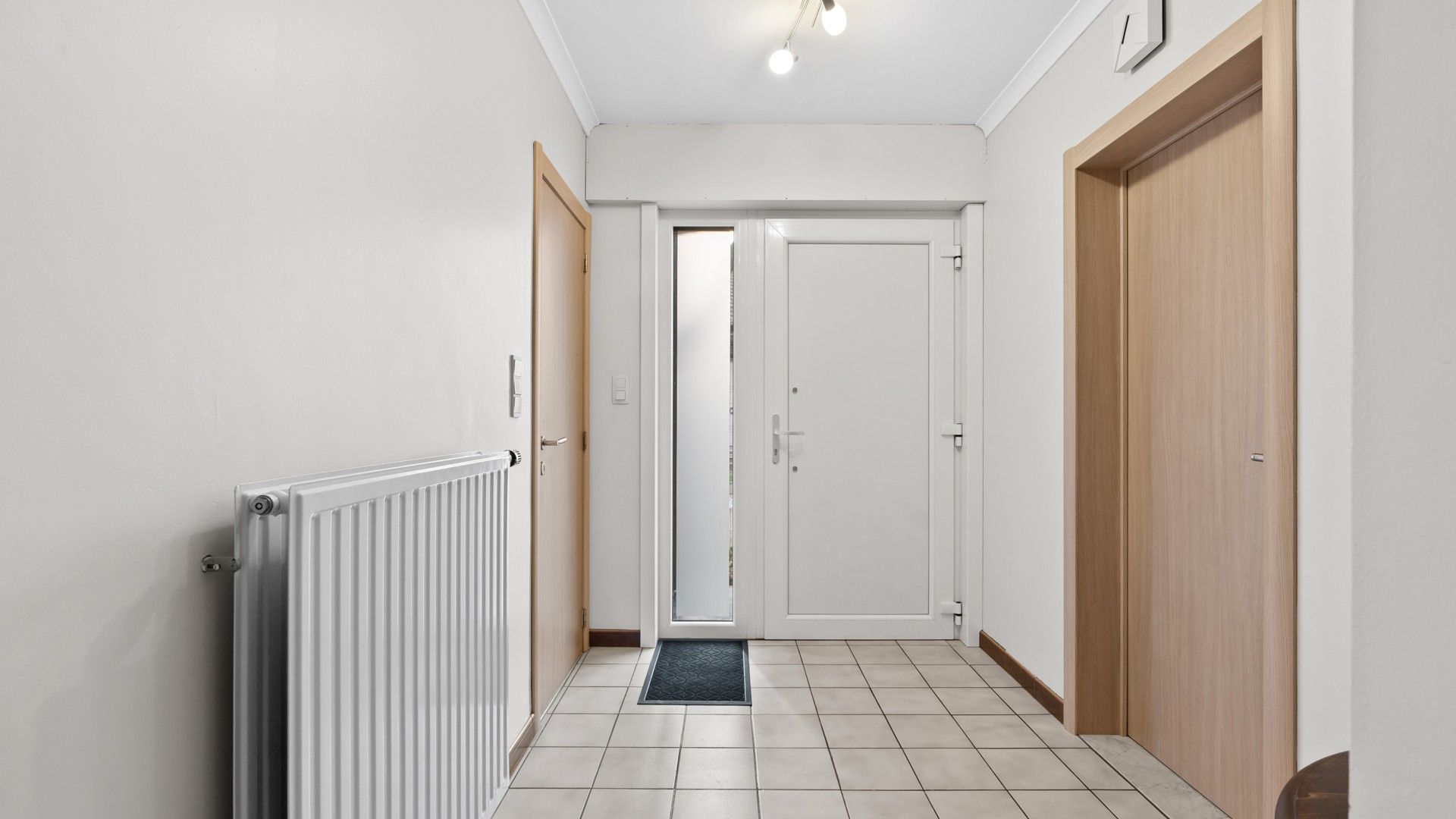 Gelijkvloerse woning met 3 slpkrs te Genk foto 3