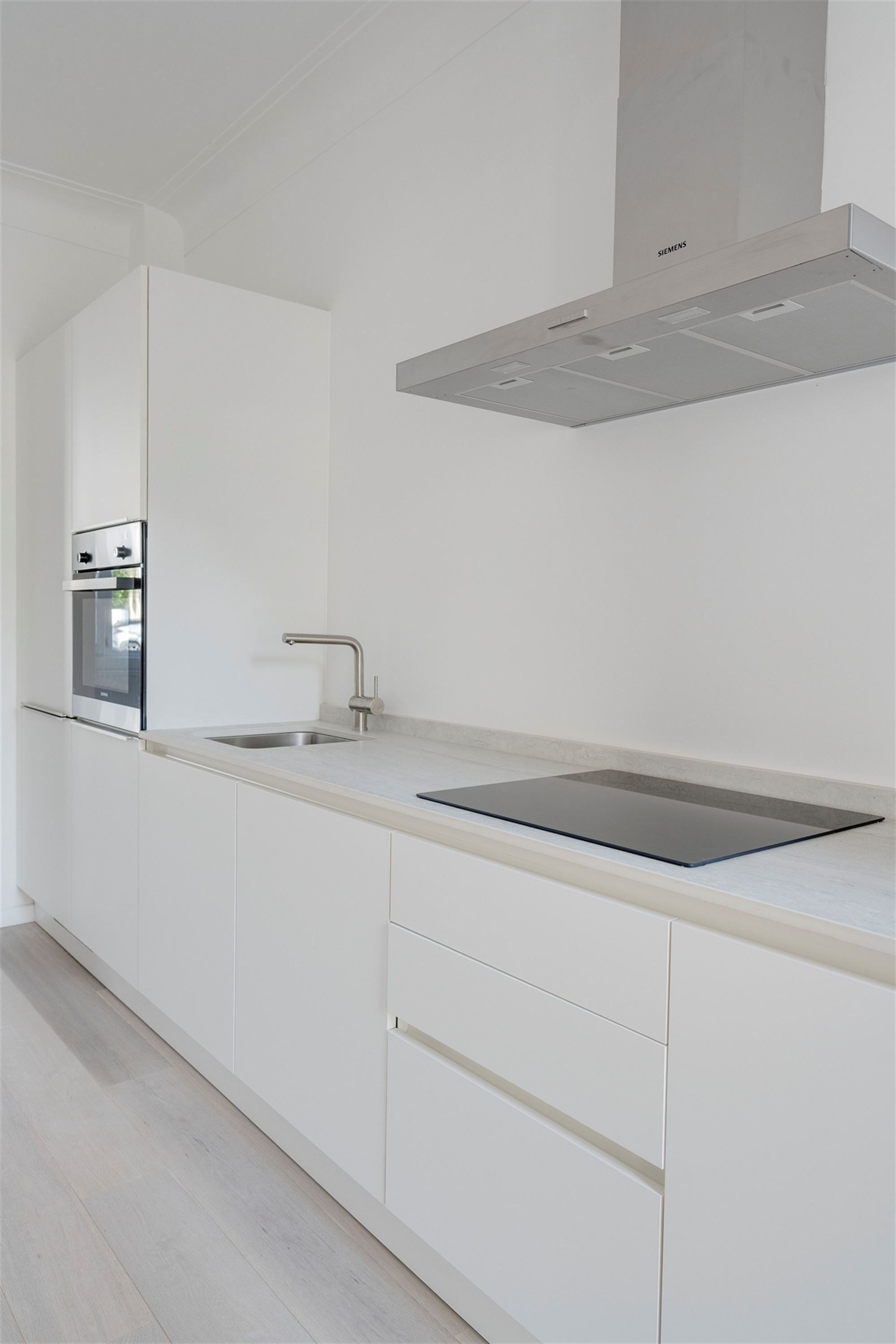 Prachtig gerenoveerd appartement met zuidgerichte tuin foto 4