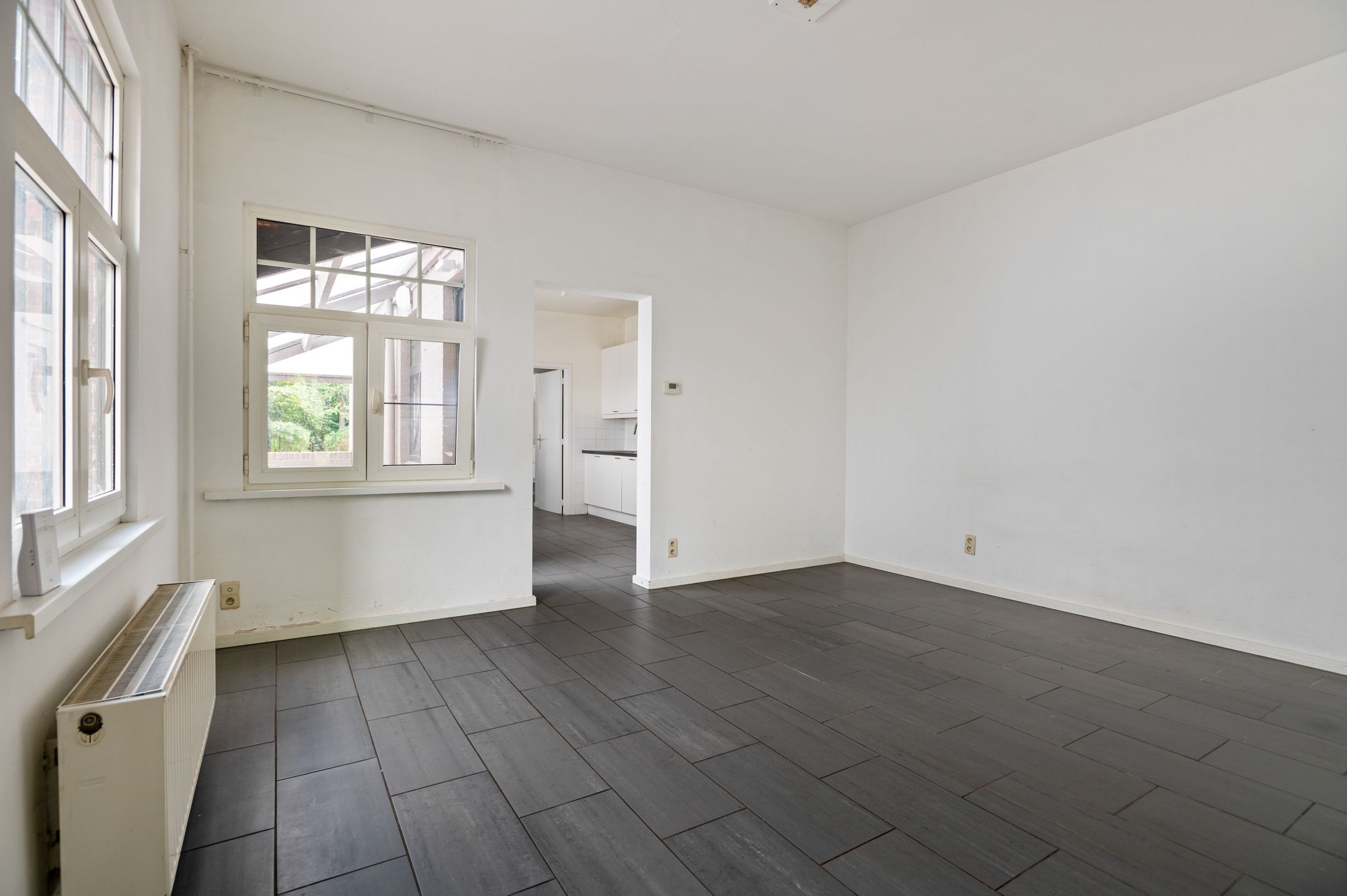 Halfopen woning met 2 slaapkamers en een grote tuin in Brasschaat te huur! foto 8