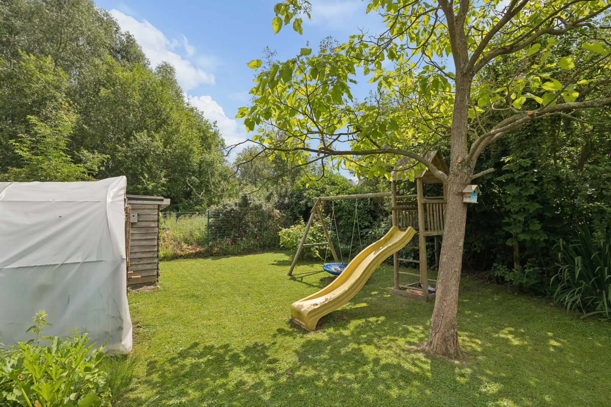 Instapklare woning met 3 slaapkamers en grote tuin foto 18