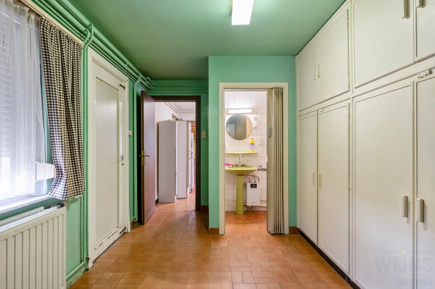 Goed onderhouden woning met tuin. foto 16