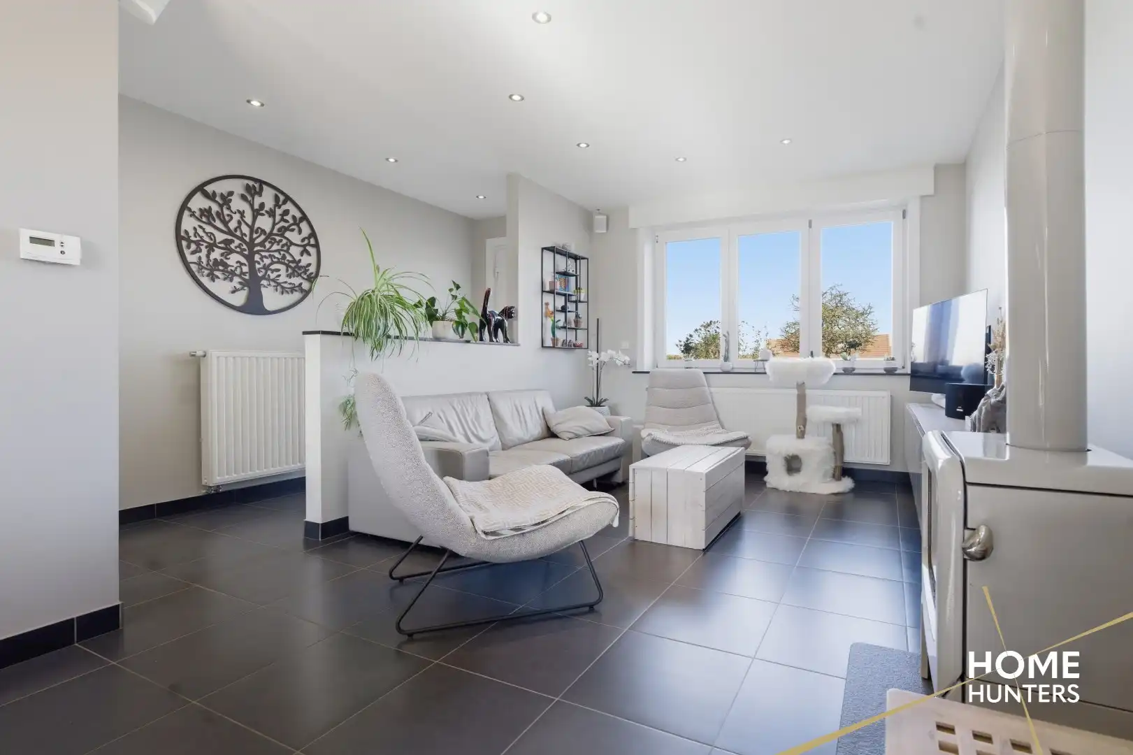 Volledig gerenoveerde gezinswoning met 4 slaapkamers en zuidgerichte tuin! foto 4