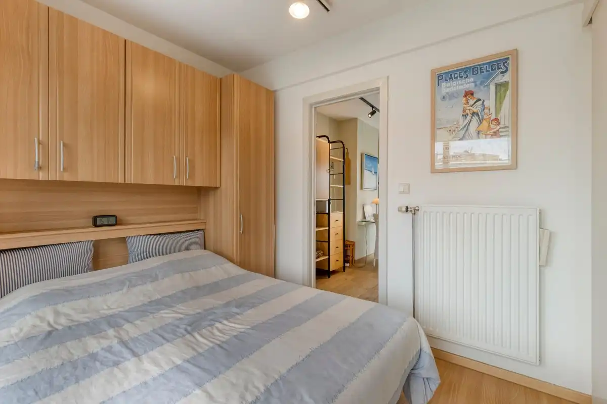 Appartement met 1 slaapkamer en twee ruime zonneterrassen, met een parkeerplaats in het gebouw die samen met het appartement aangekocht dient te worden. foto 13