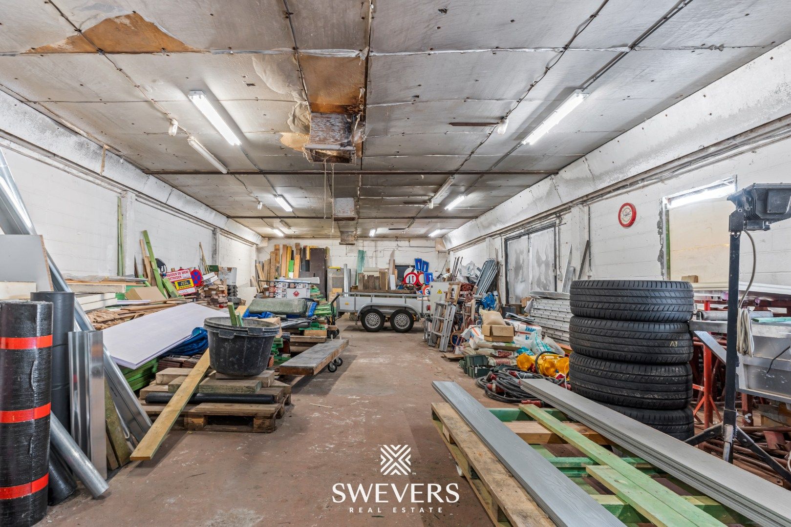 Instapklare gezinswoning met magazijn op ruim perceel foto 28