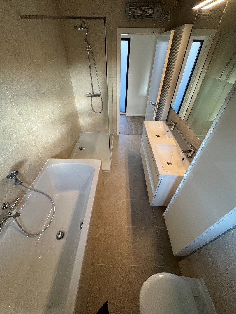 een instapklare 4-gevelwoning met tuin foto 12