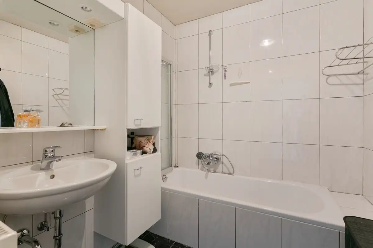 Appartement met twee slaapkamers en autostaanplaats in de ondergrondse garage in Rekem/Lanaken! foto 14