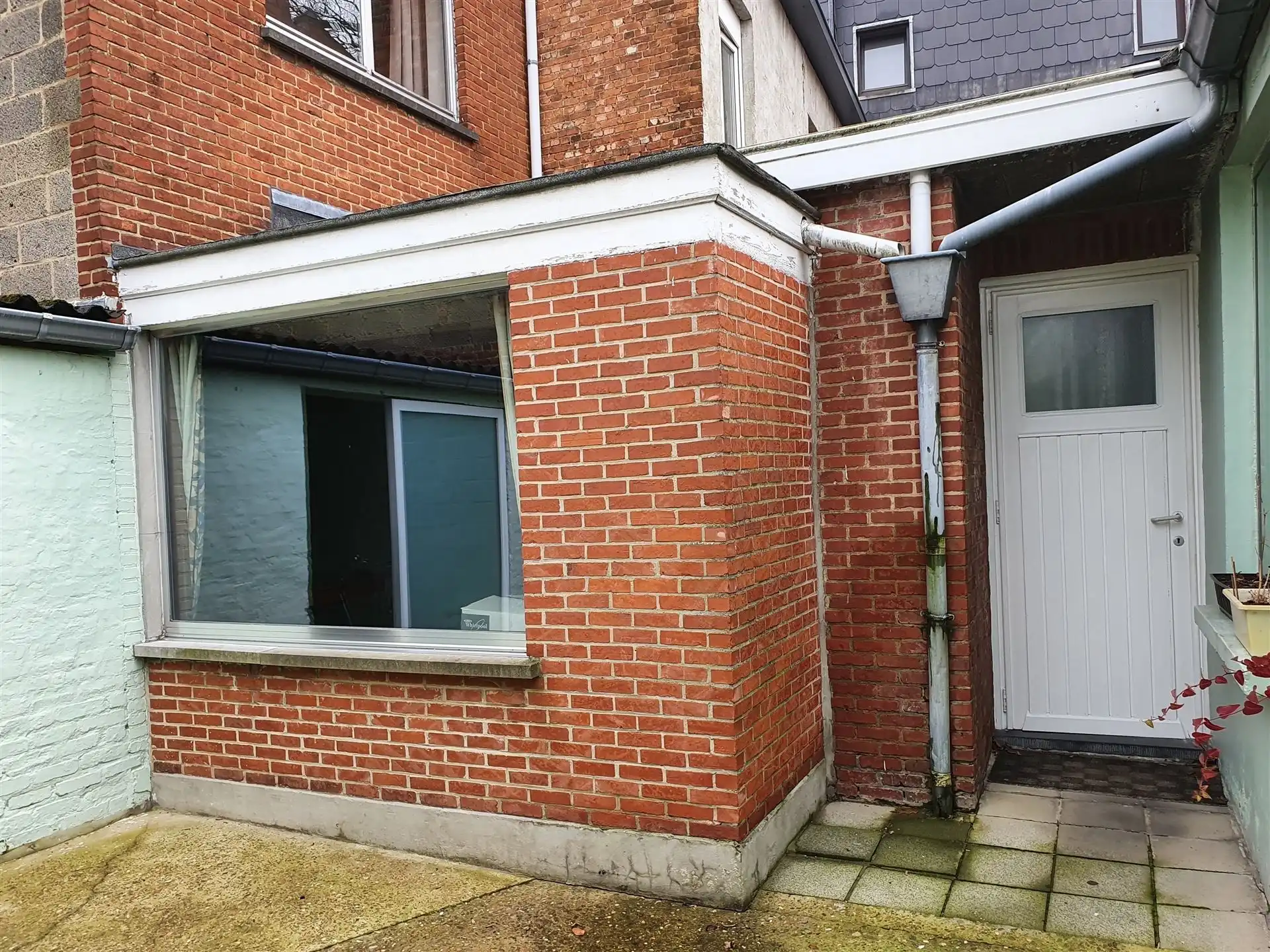 Te renoveren stadswoning met garage in Diest. foto 5