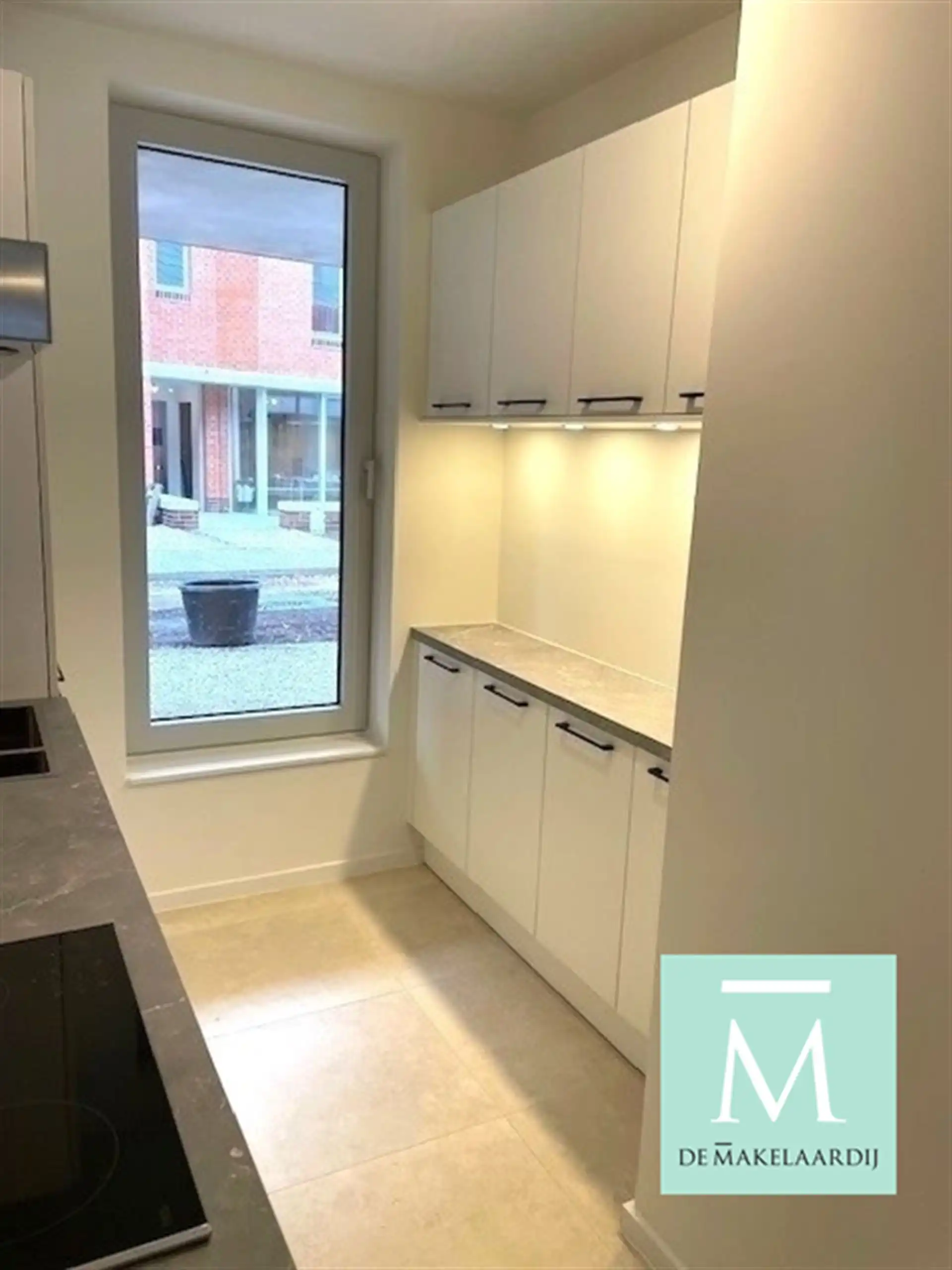 Gelijkvloers nieuwbouwappartement met 2 slaapkamers, terras/tuin op toplocatie! foto 2