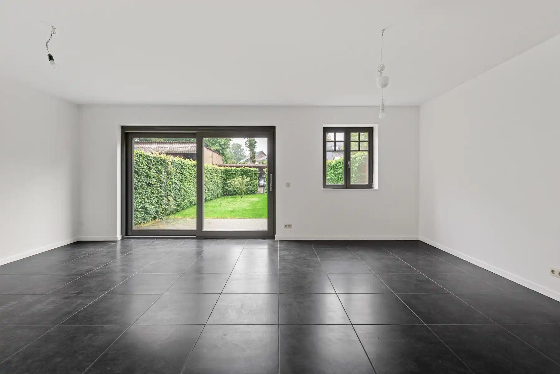 Gelijkvloers app. met tuin in het centrum van 's Gravenwezel. foto 2