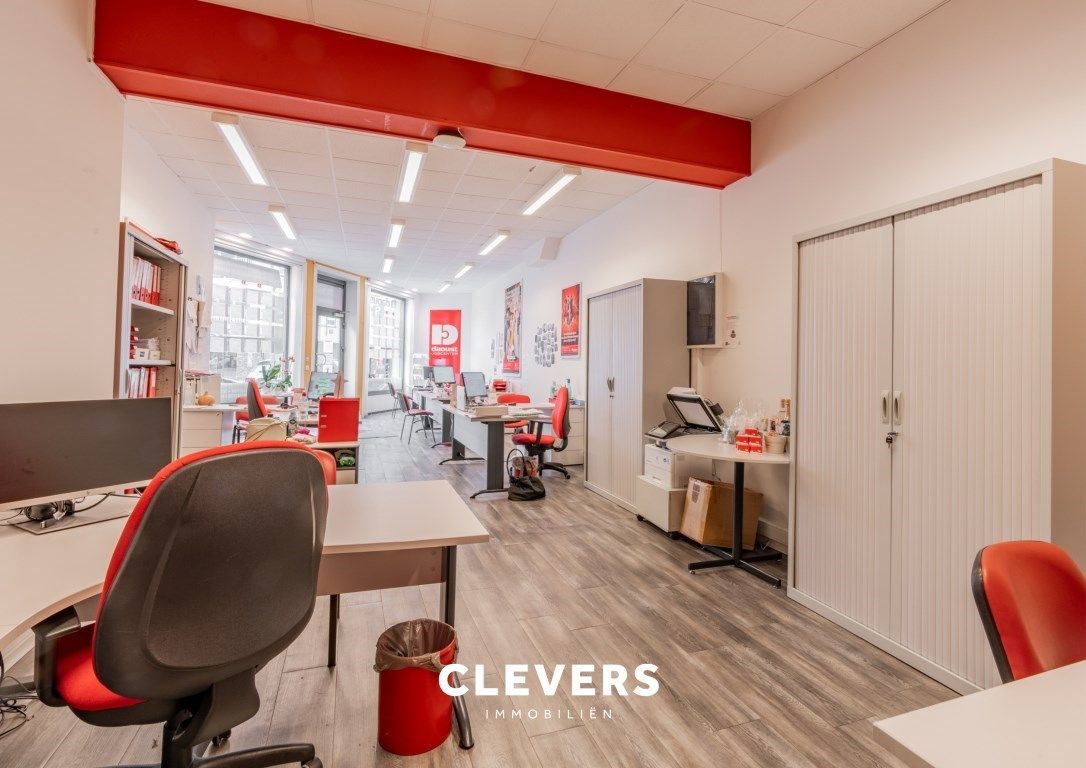 Opbrengsteigendom met lopende handelshuur + 2 appartementen foto 8