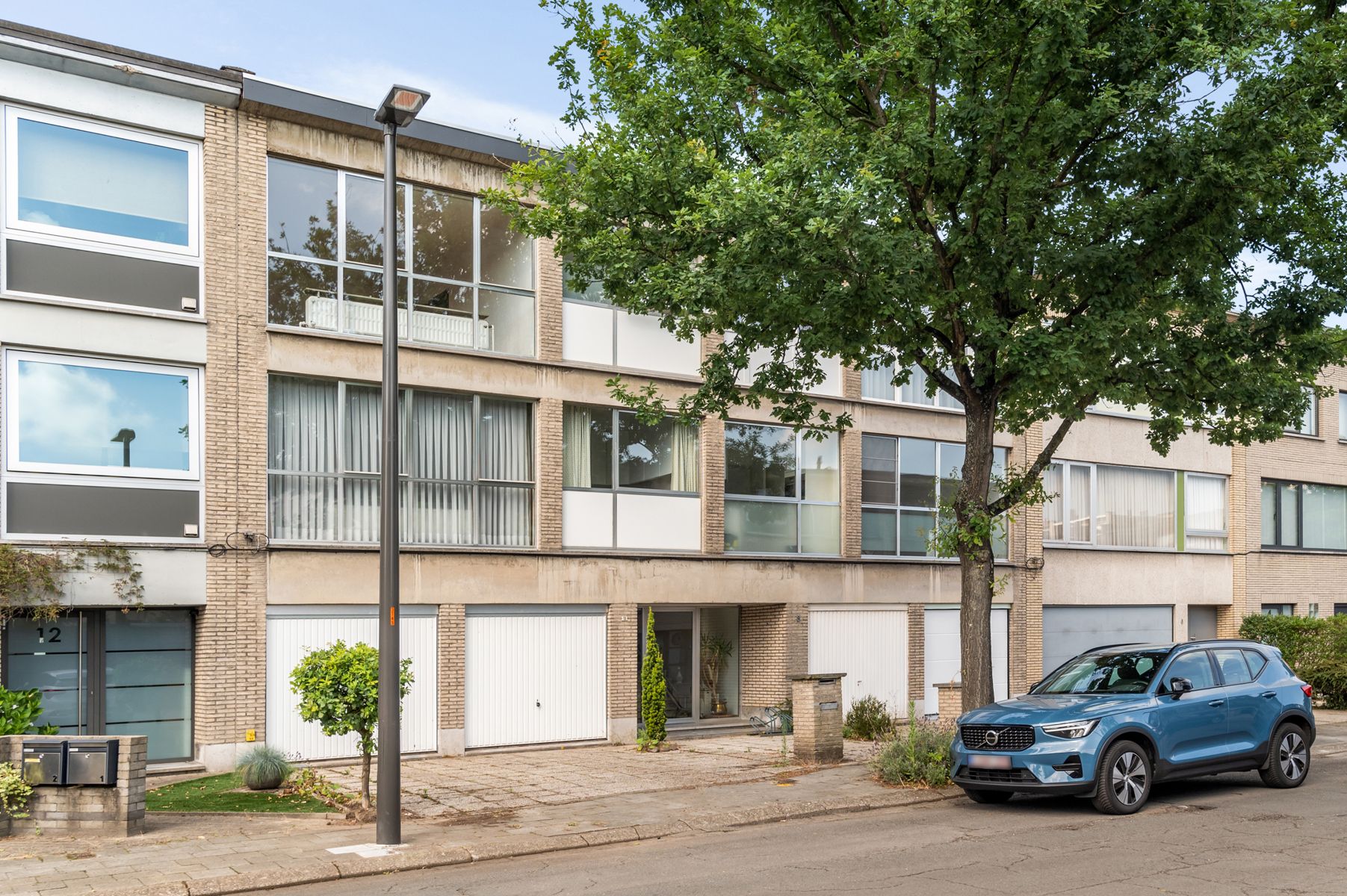 Unieke kans: 2 appartementen met tuin, garagebox en berging foto 31