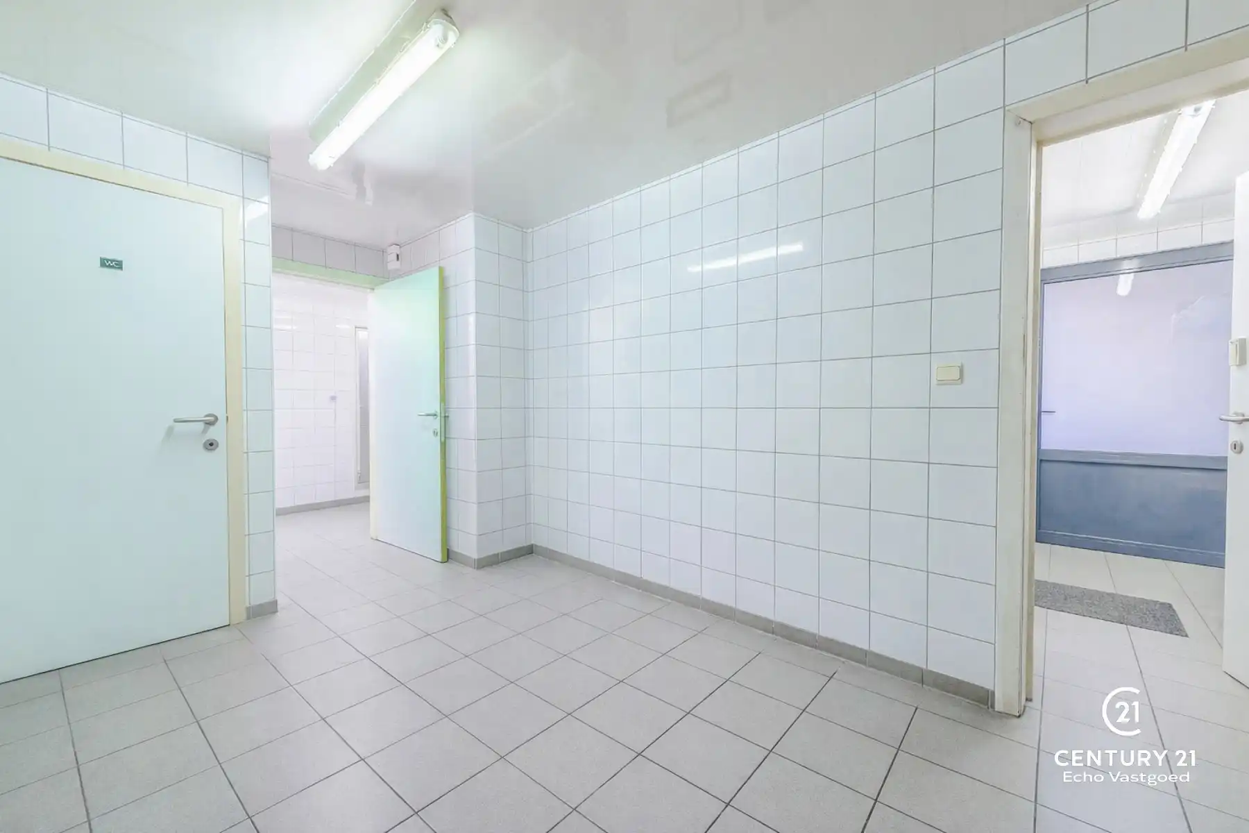 Handelszaak met gerenoveerde woonst op topligging  foto 2