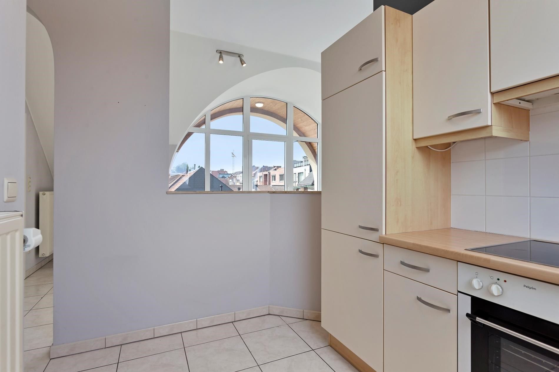 Aangenaam en luchtig appartement met 1 slaapkamer, terras & autostandplaats in ondergrondse garage in hartje Hoeselt foto 14