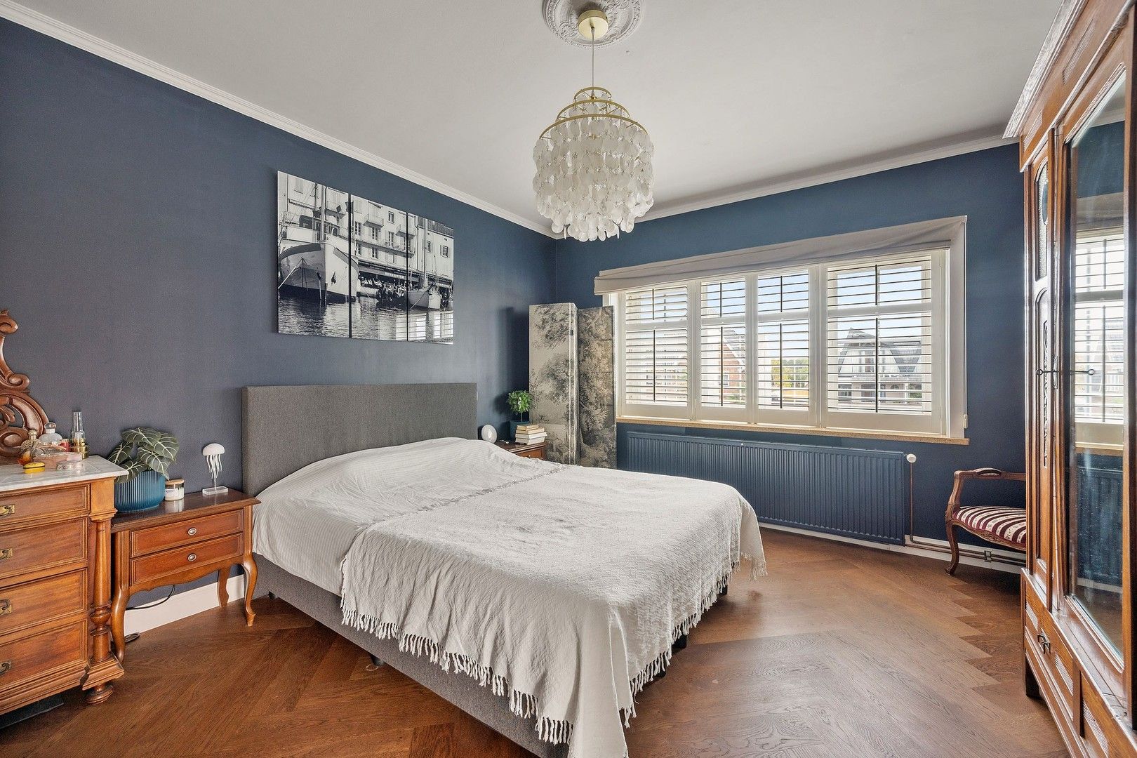 Prachtige karaktervolle, halfopen, robuuste én energiezuinige bel-étage van de jaren '50 met 4 slaapkamers, garage, kelderverdieping en paradijselijke tuin. foto 20