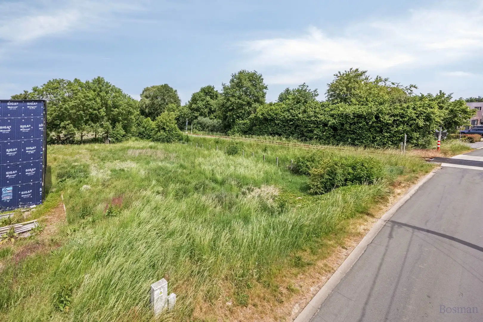 Projectgrond met vergunde plannen voor 2 halfopen bebouwingen te koop in Diest foto {{pictureIndex}}