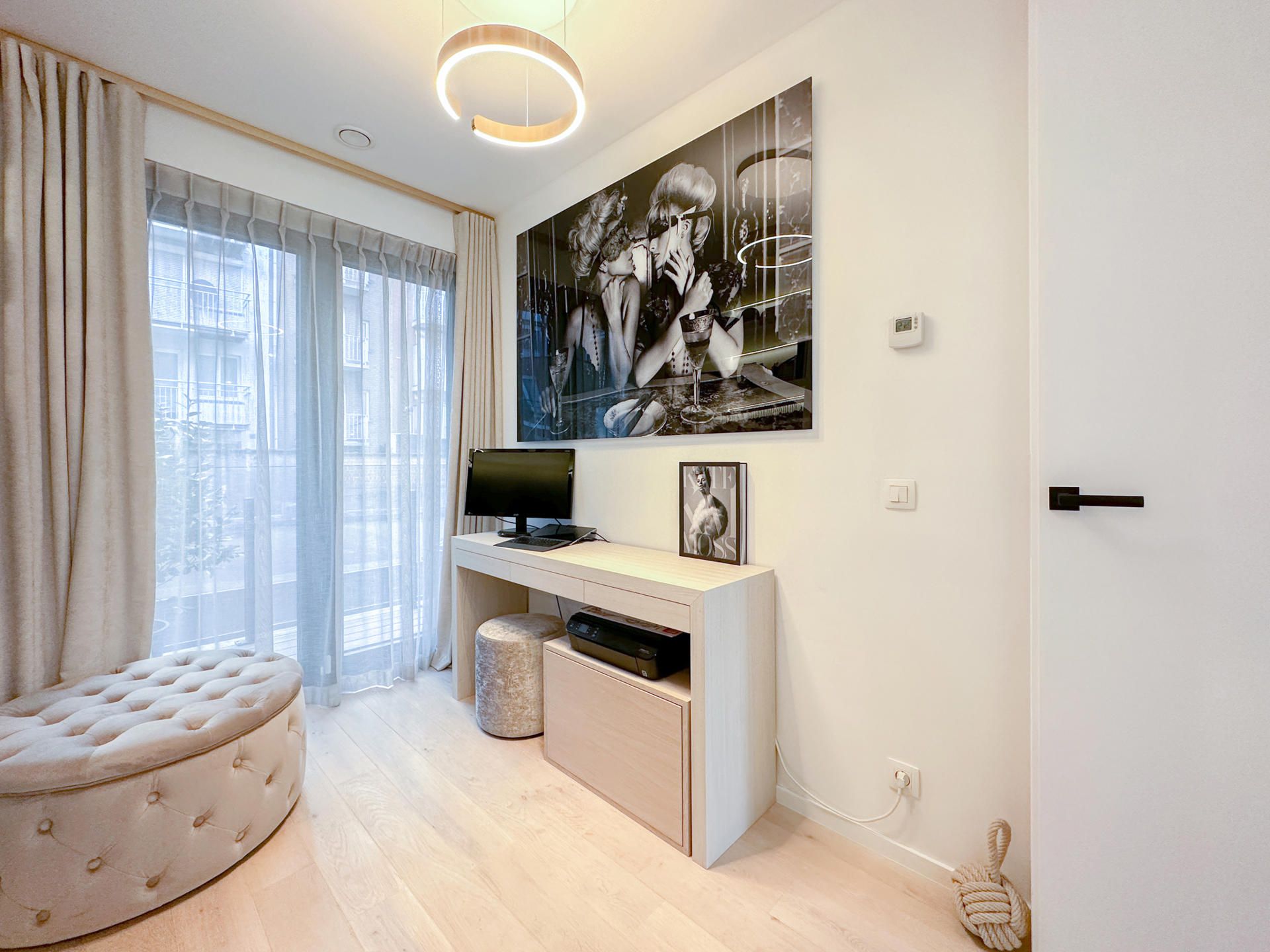 Subliem nieuwbouwappartement in het Zoute met zonnig terras foto 28