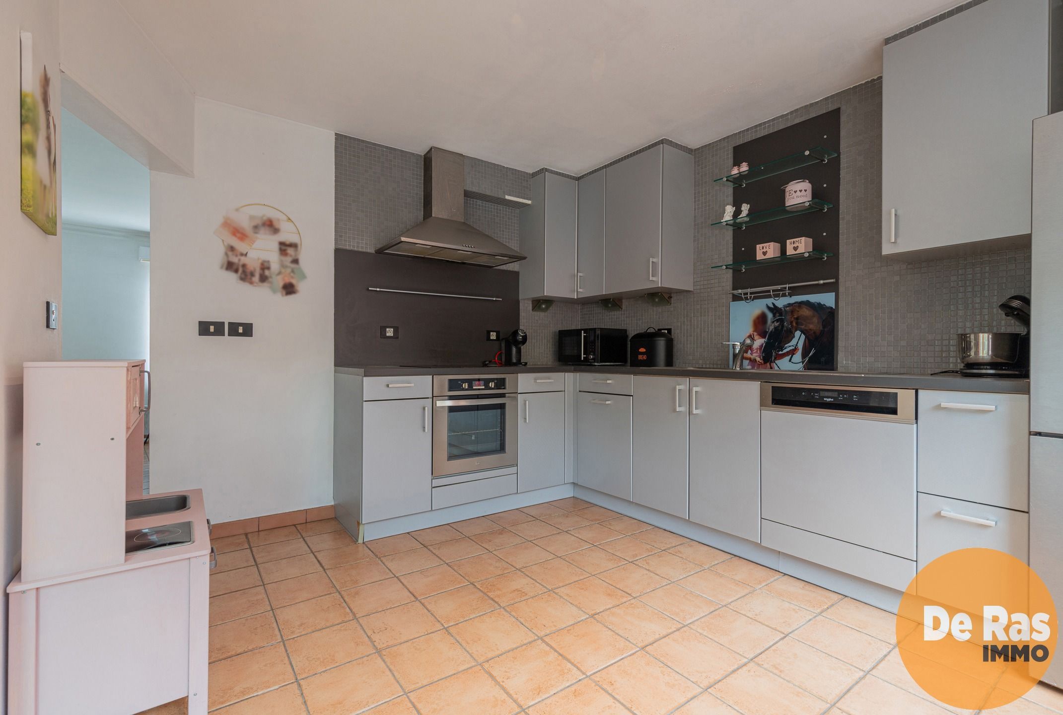 NIEUWERKERKEN–Gezellige woning met terras, centrale ligging! foto 7