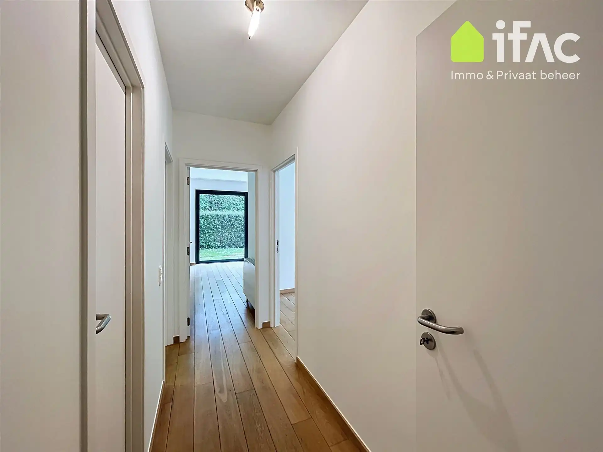 Exclusief gelijkvloers appartement met 2sk en privé tuin foto 13