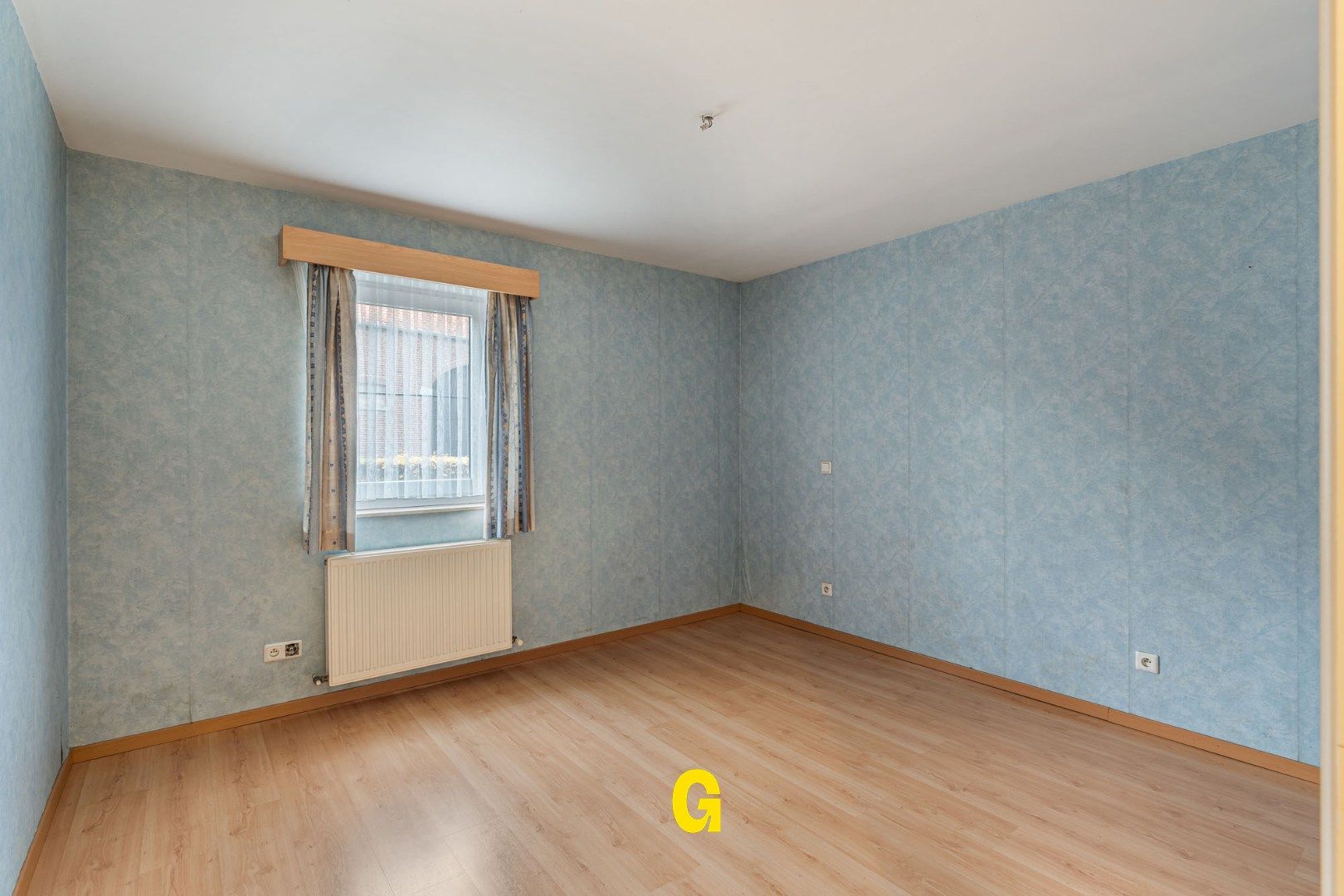 Degelijk (rolstoelvriendelijk) gelijkvoersappartement met terras uitgevend op de tuin, afsluitbare garage en berging foto 19