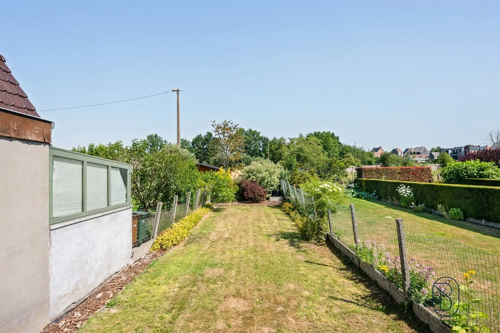 Instapklare bel-etagewoning met aangename tuin en 5 SLK! foto 3