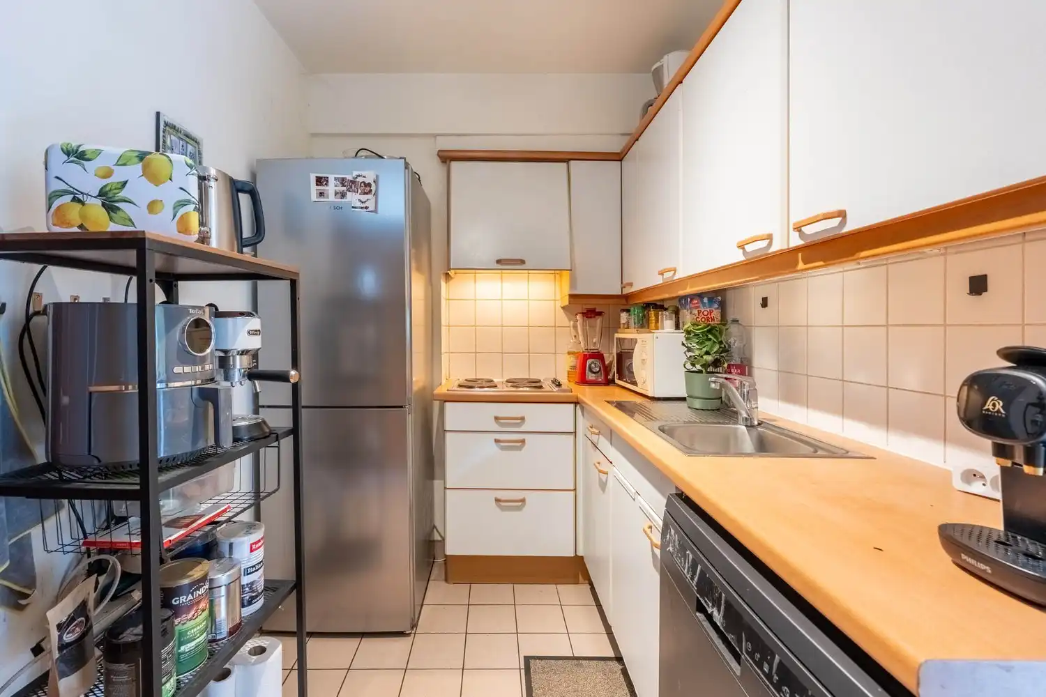 Centraal gelegen appartement met 2 slaapkamers, een terras en de mogelijkheid om een autostaanplaats en kelder bij aan te kopen te Leuven! foto 9