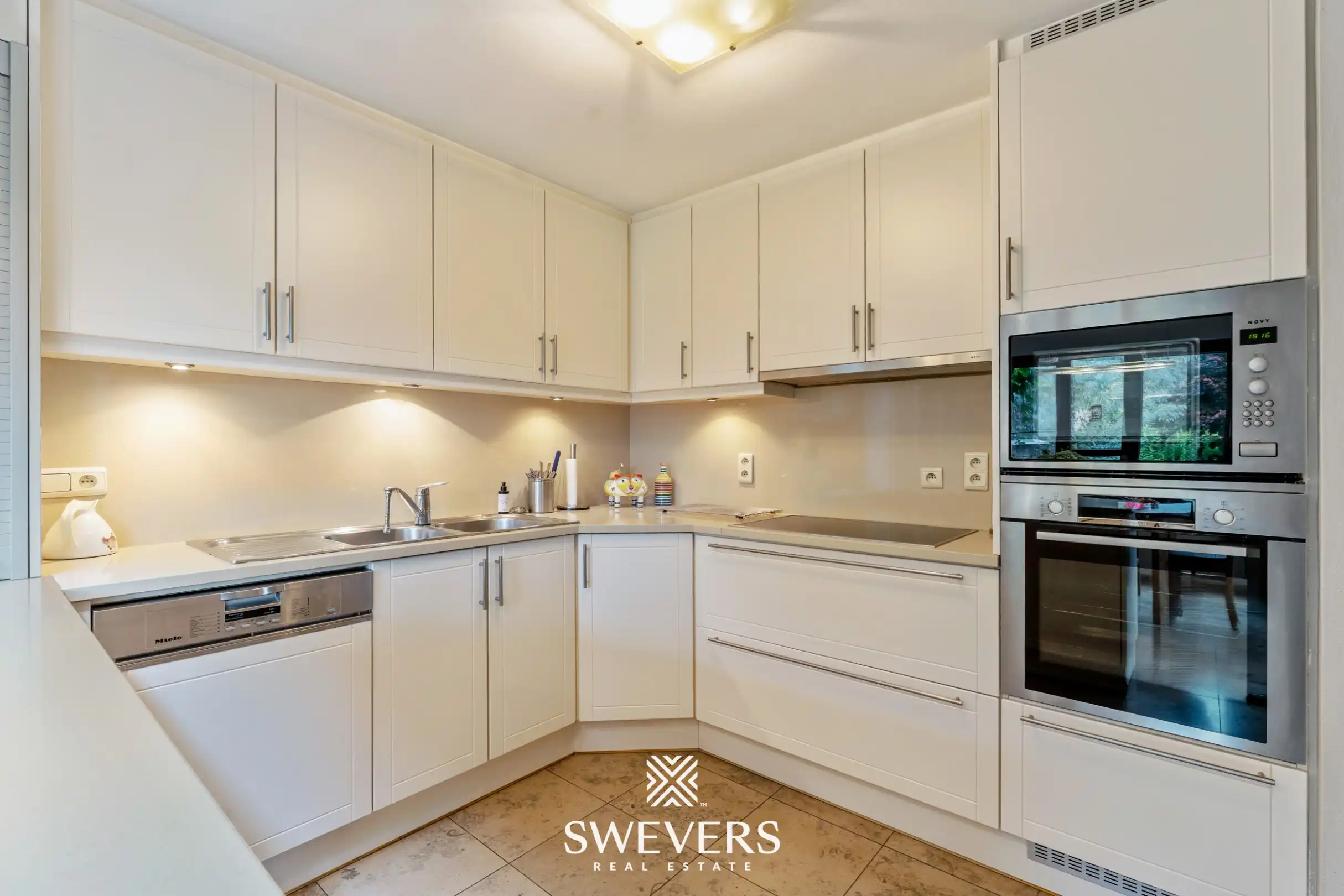 Opbrengsteigendom: lichtrijke en instapklare woning op 9a75ca nabij Hasselt centrum foto 9